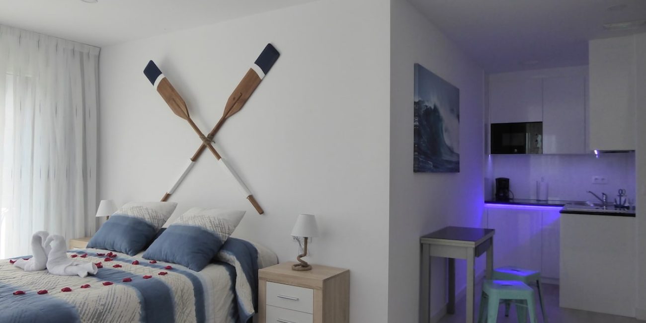 Dormitorio y cocina de Villas Marineras